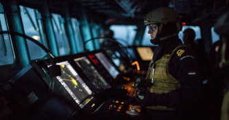 Royal Norwegian Navy crew at ship bridge
