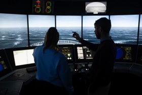 Simulation-based training at NMCI, where students develop practical skills in navigation, communication and situational awareness under instructor guidance.