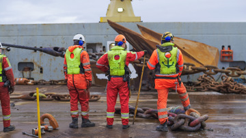 Workers on the deck of the Normand Drott.