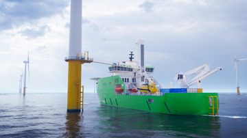 An eCSOC vessel by Bibby Marine connected to a wind turbine at sea.